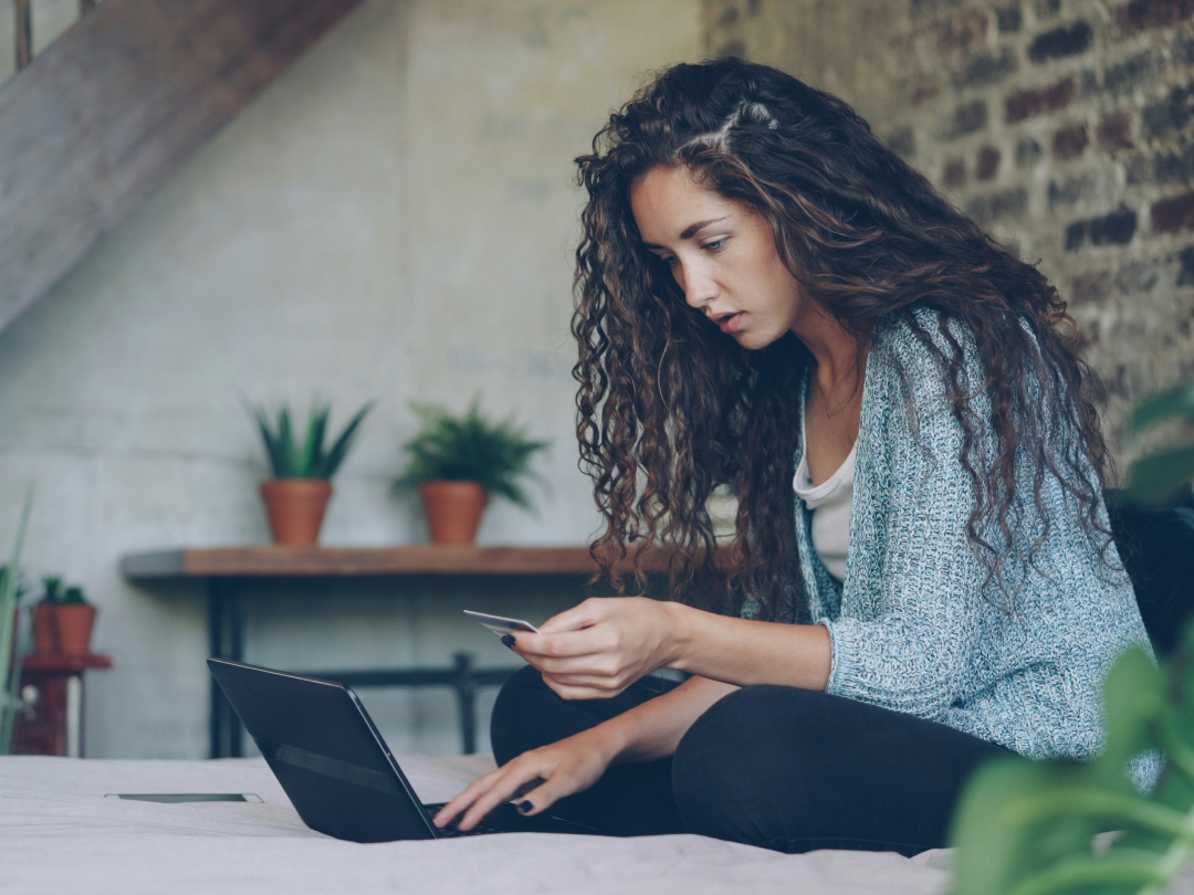 A Canadian woman trying to apply for credit online and not understanding why her credit score has unchanged and why she's being charged more in interest.